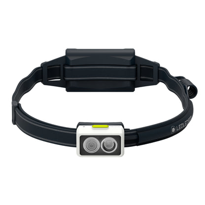 Black LED headlamp with a white label on a white background