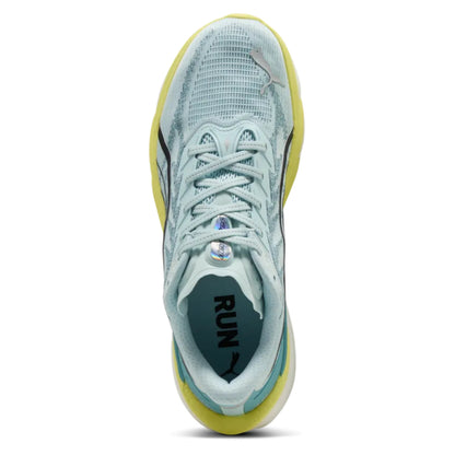 Light blue Puma running shoe with yellow accents on a white background