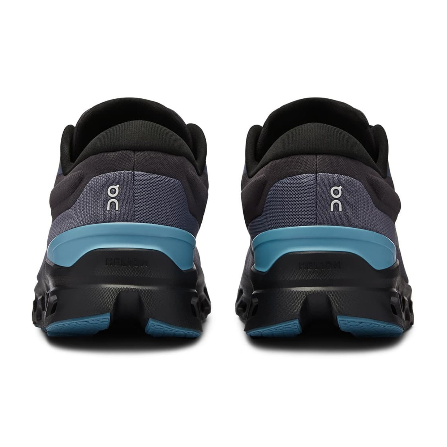 Black and blue running shoes with 'On' branding on a white background