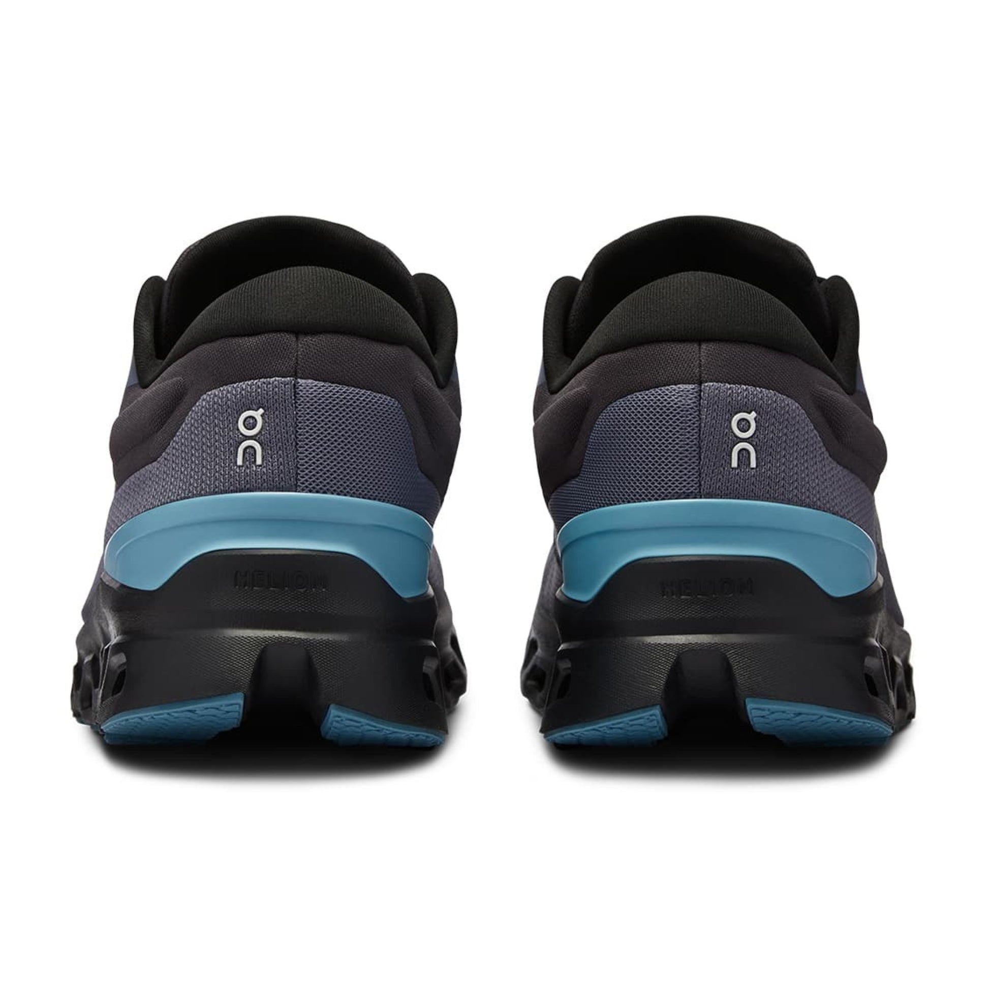 Black and blue running shoes with 'On' branding on a white background