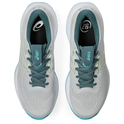 Gray and teal Asics running shoes on a white background