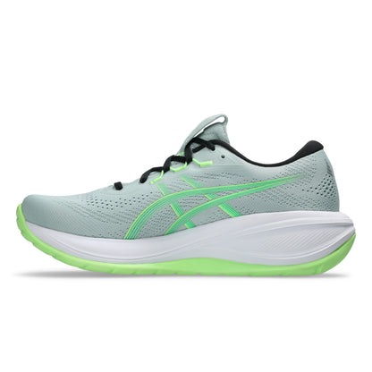 Light blue Asics running shoe with green accents on a white background