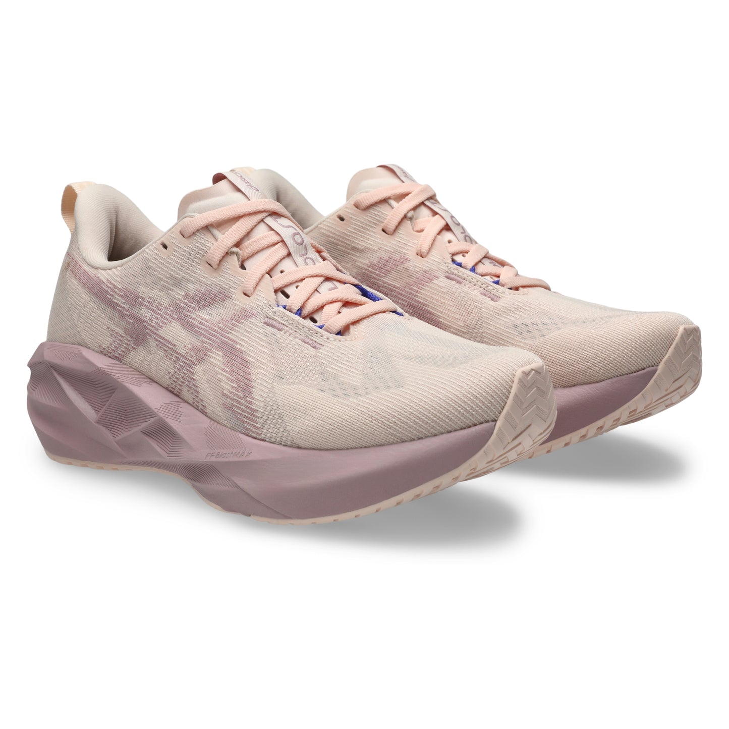 Pink Asics running shoes on a white background