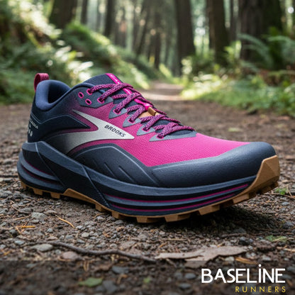 Pink and blue running shoe on a forest path with 'Baseline Runners' branding.
