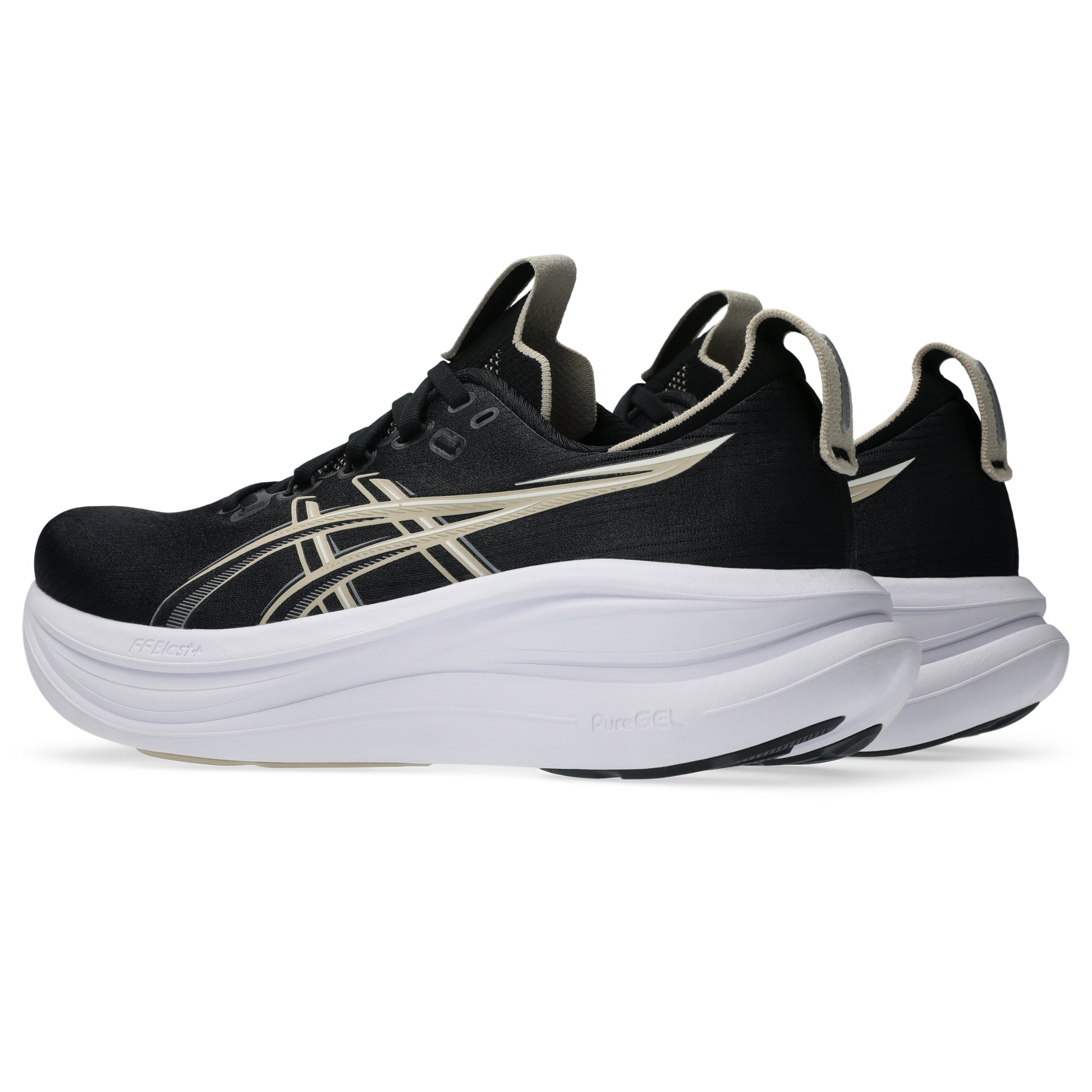 Black Asics running shoes with white soles on a white background