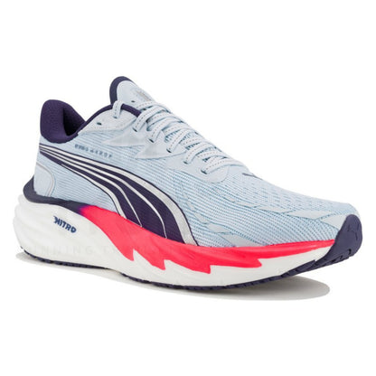 Light blue Puma running shoe with pink accents on a white background