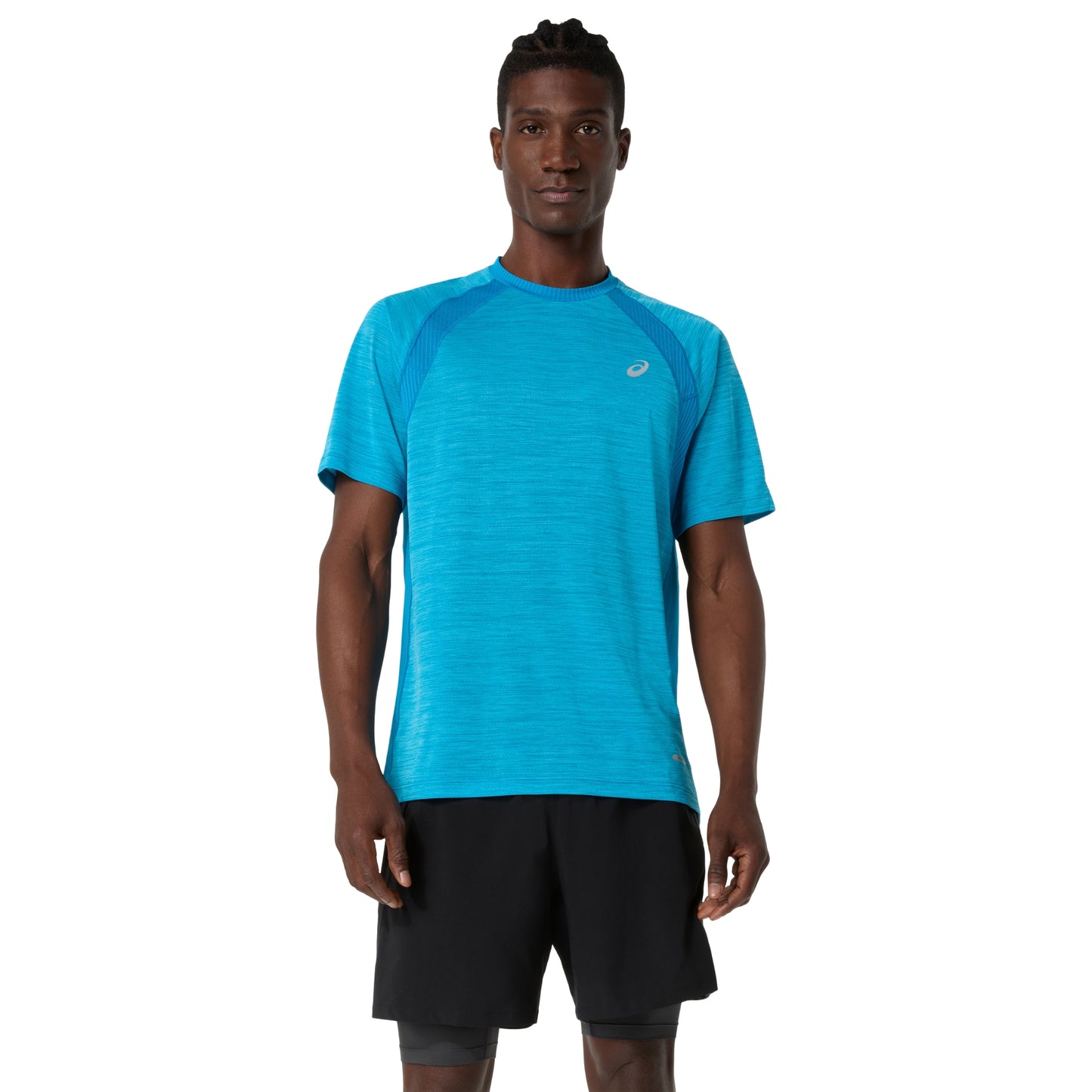 Man wearing a Asics blue shirt and black shorts on a white background