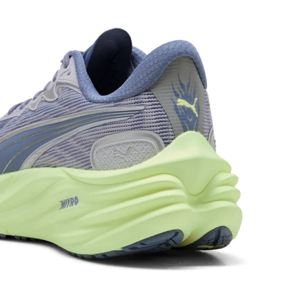 Puma running shoe with a light purple upper and bright green sole on a white background