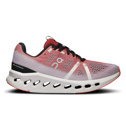 Pink running shoe with white sole on a white background