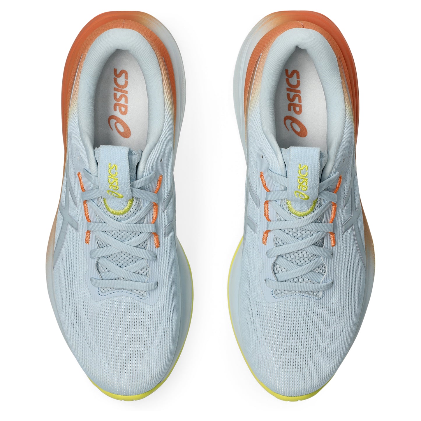 Pair of White and orange Asics running shoe with yellow accents on a white background