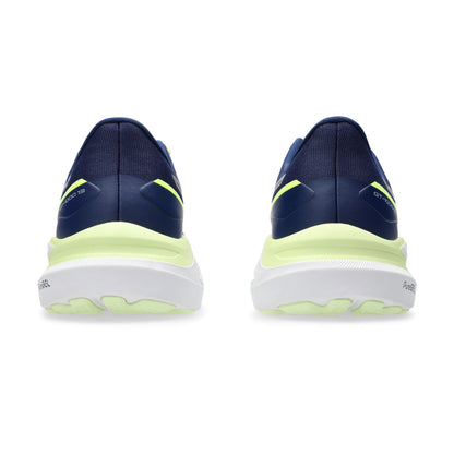 Blue and green athletic shoes on a white background