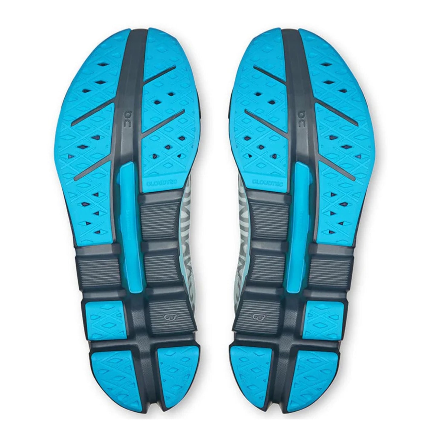 Blue and black shoe soles on a white background