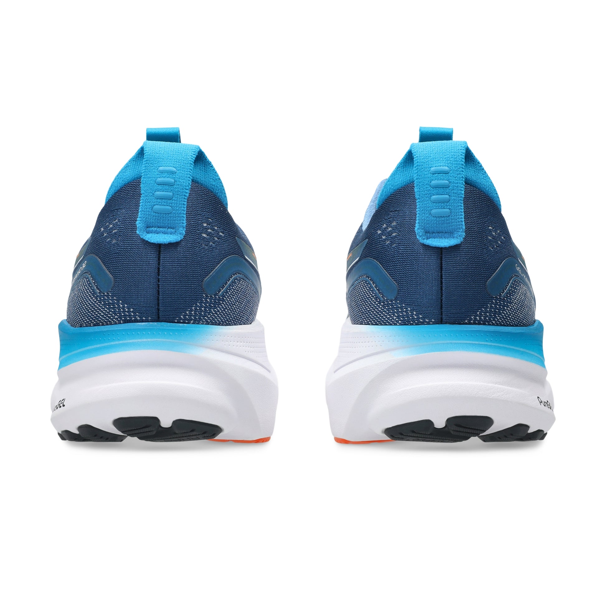 Blue running shoes with white soles on a white background