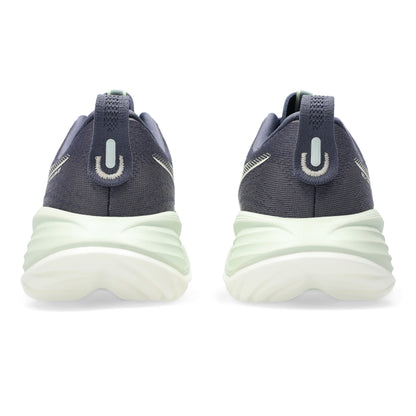 Pair of navy and white sneakers on a white background