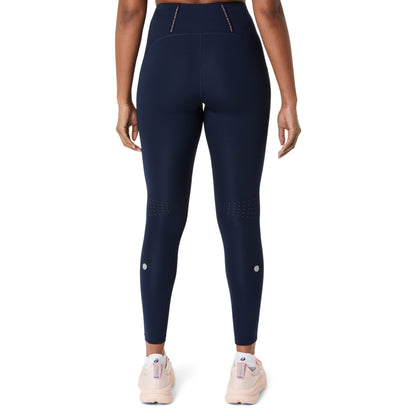 Asics Navy leggings worn by a person on a white background