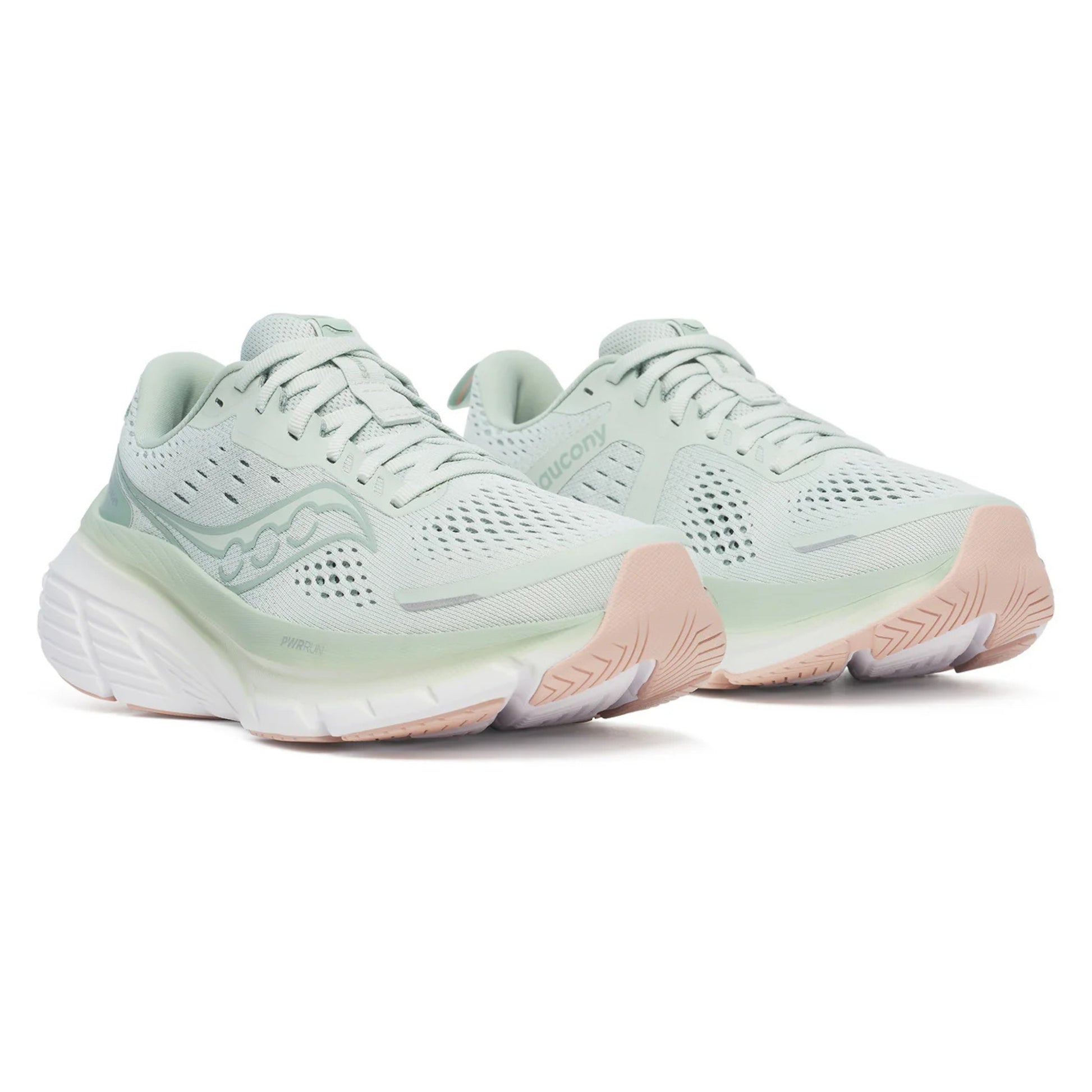 Pair of light green running shoes with light brown soles on a white background