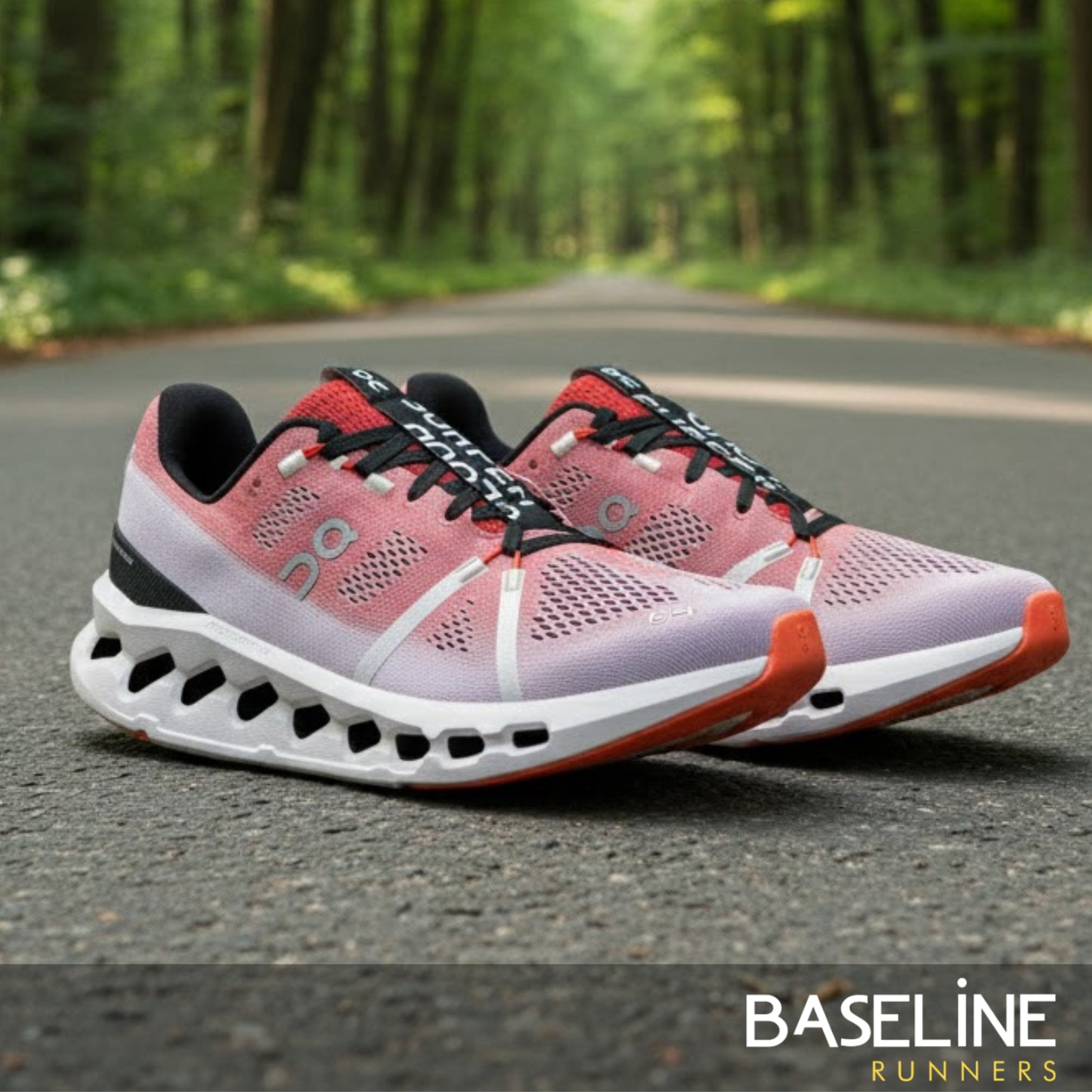 Pink and red running shoes on a road with a forest background, featuring the 'Baseline Runners' brand.