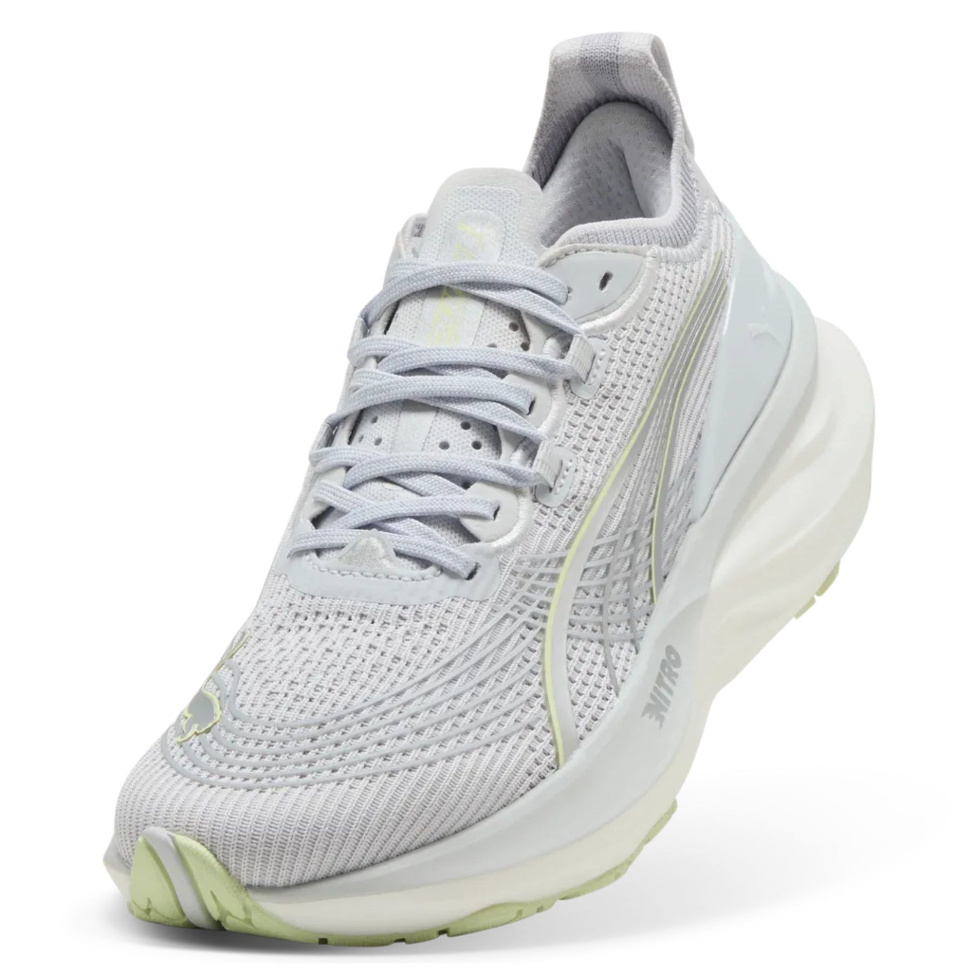 Light gray Puma running shoe with white sole on a white background