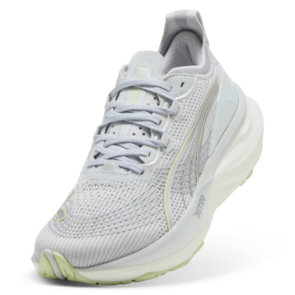 Light gray Puma running shoe with white sole on a white background