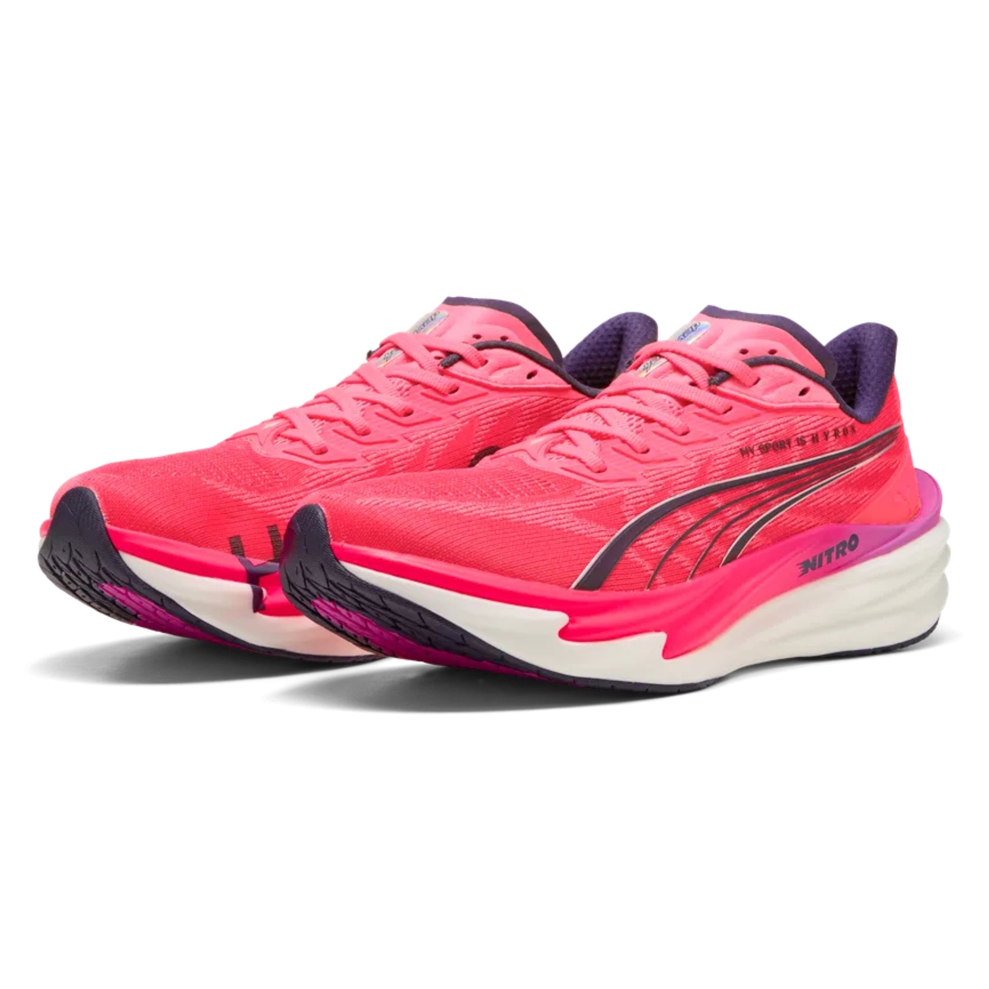 Pink Puma running shoes with black accents on a white background