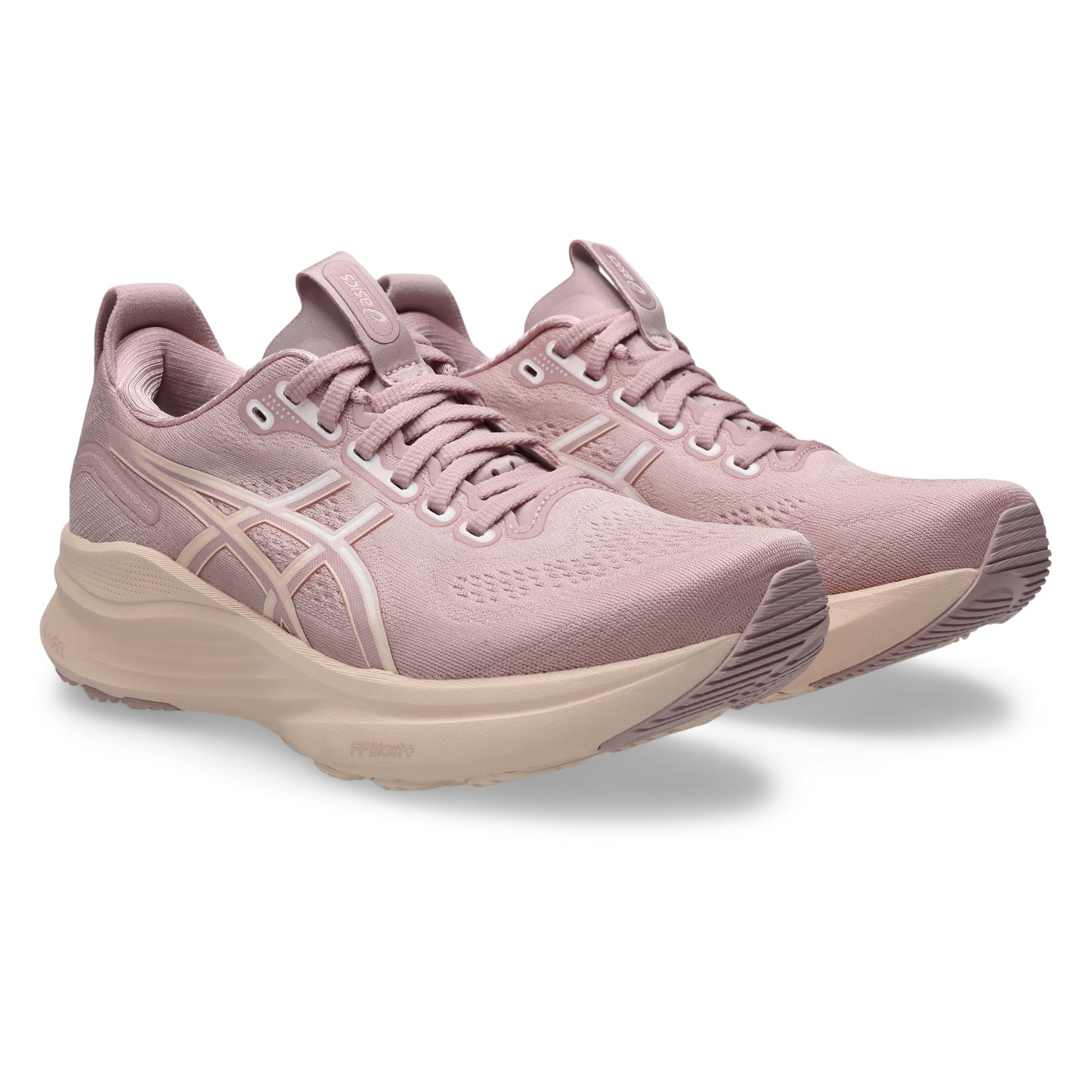 Pair of pink running shoes on a white background