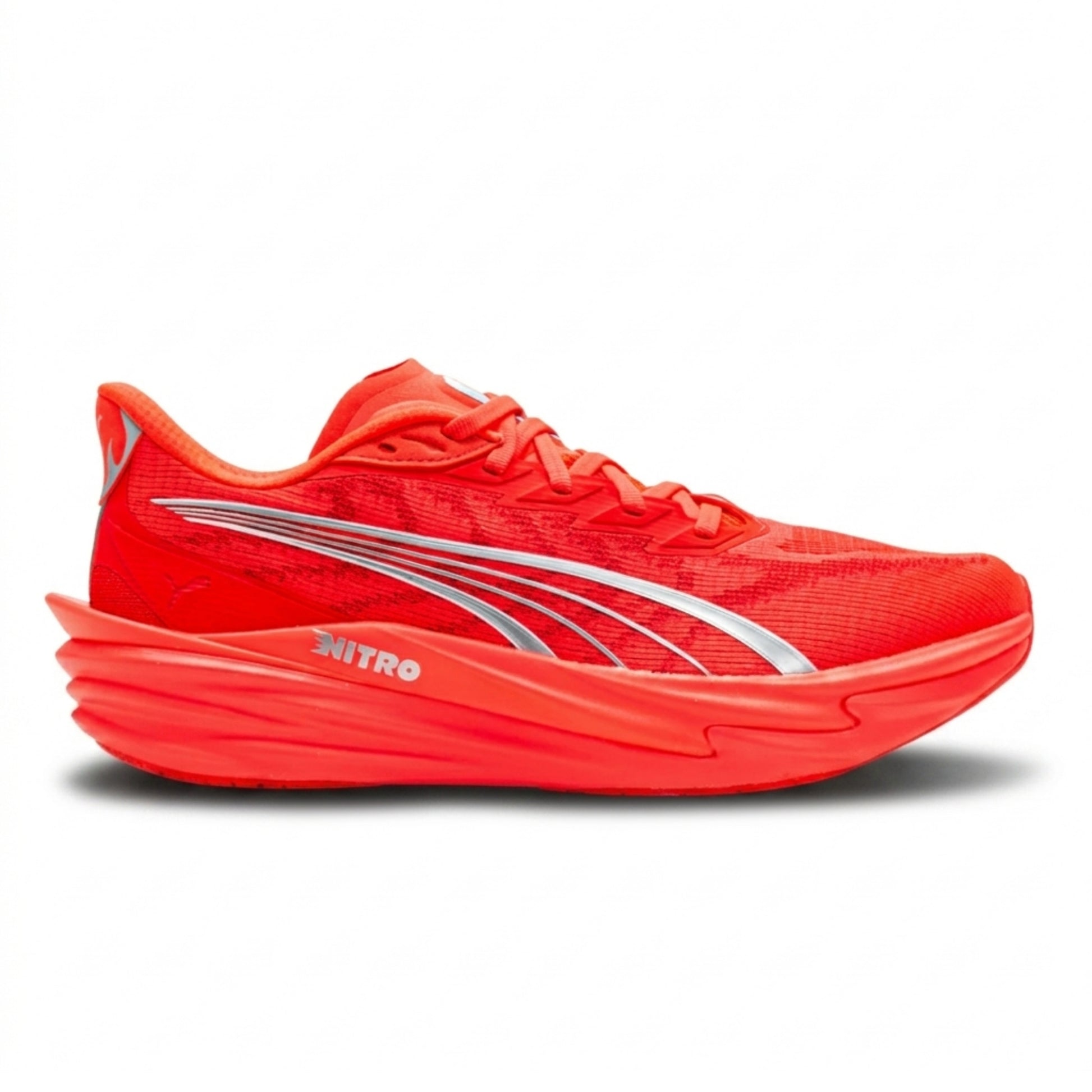 Red Puma running shoe with a white logo on a white background