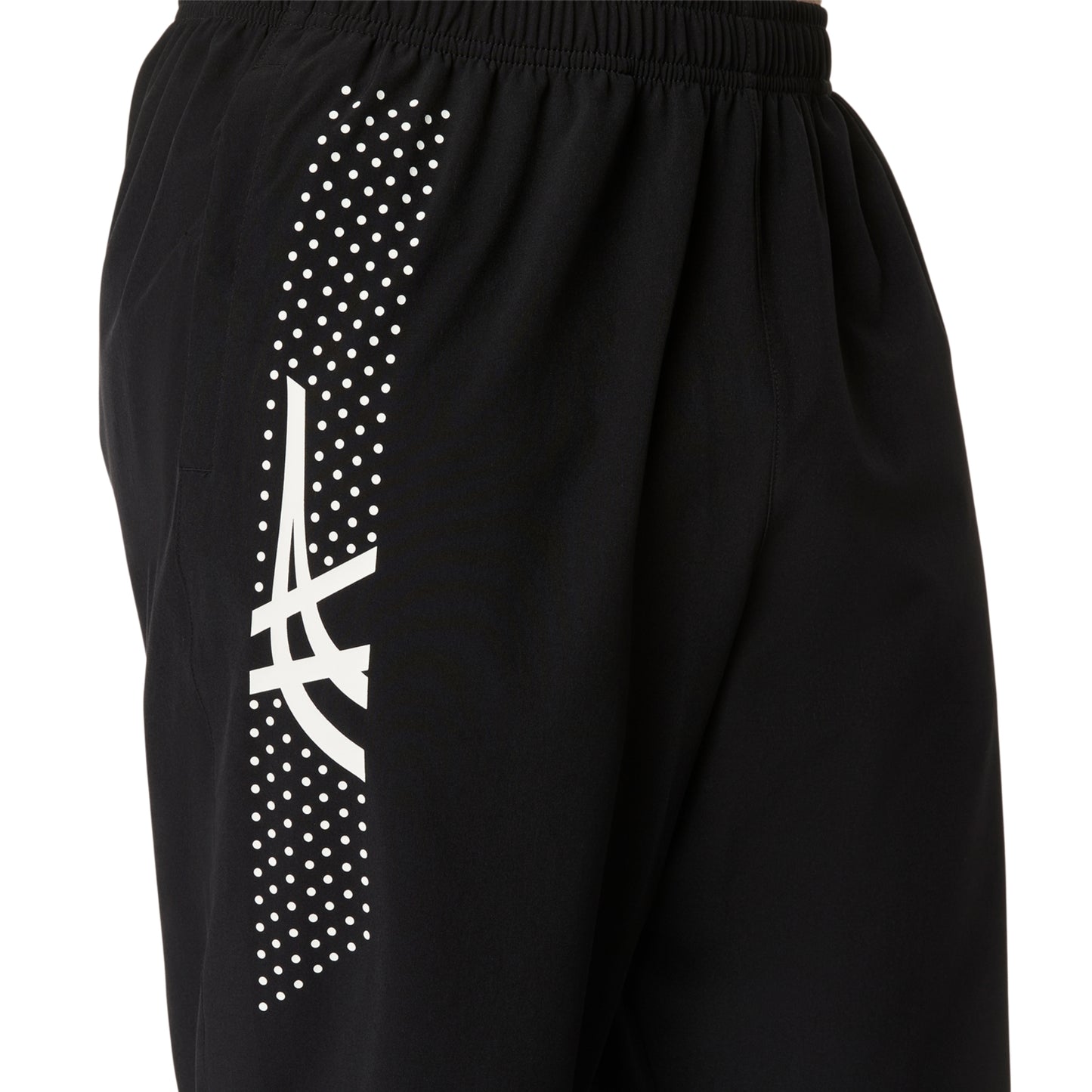 Black shorts with a white logo and polka dot pattern on a white background