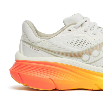 White Saucony running shoe with orange and yellow sole with the wording Guide 19 on a white background