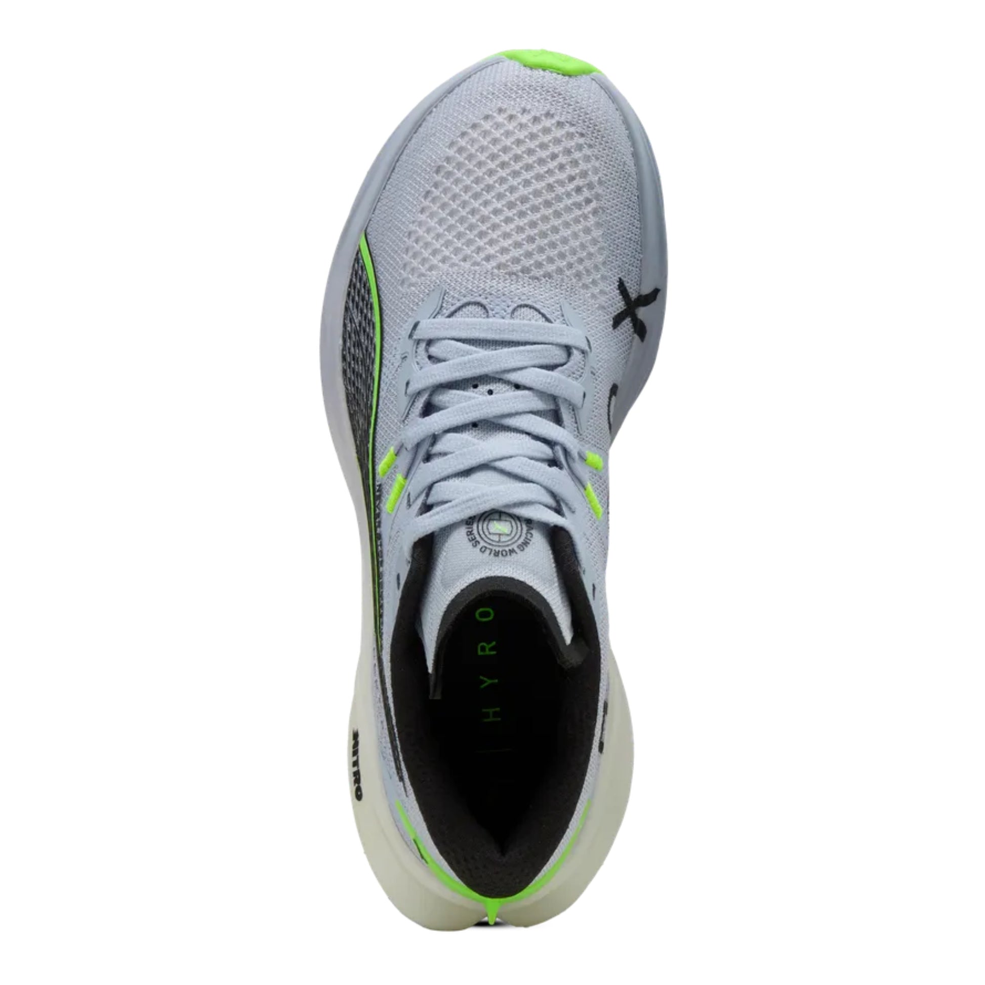 Gray Puma running shoe with green accents on a white background