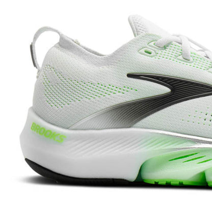 White running shoe with green accents and Brooks logo on a white background