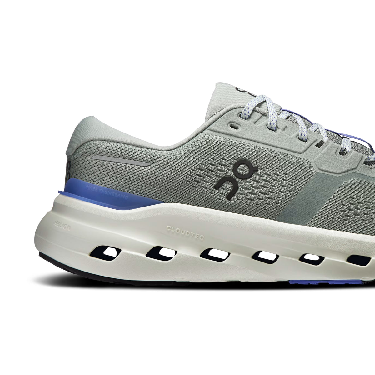 A side profile view of an On running shoe in light gray and white with a blue accent stripe and logo, set against a plain white background.
