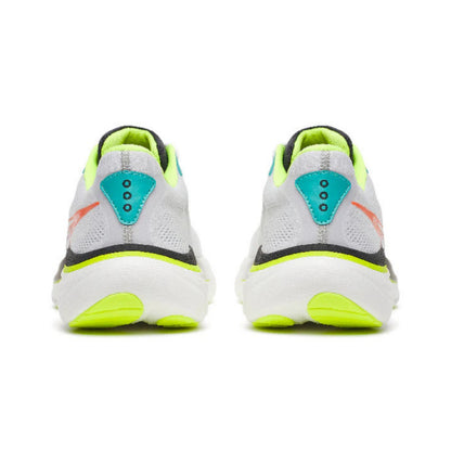 White and black running shoes with yellow accents on a white background