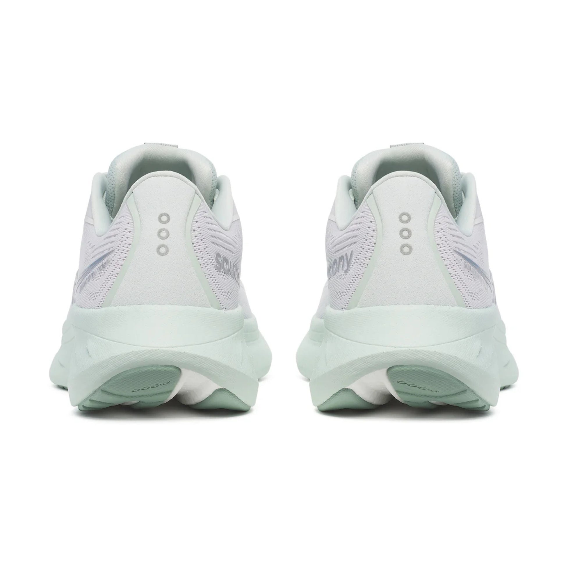 White and light green back of running shoe with a light green sole and 3 silver dots 