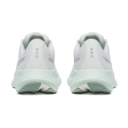 White and light green back of running shoe with a light green sole and 3 silver dots 