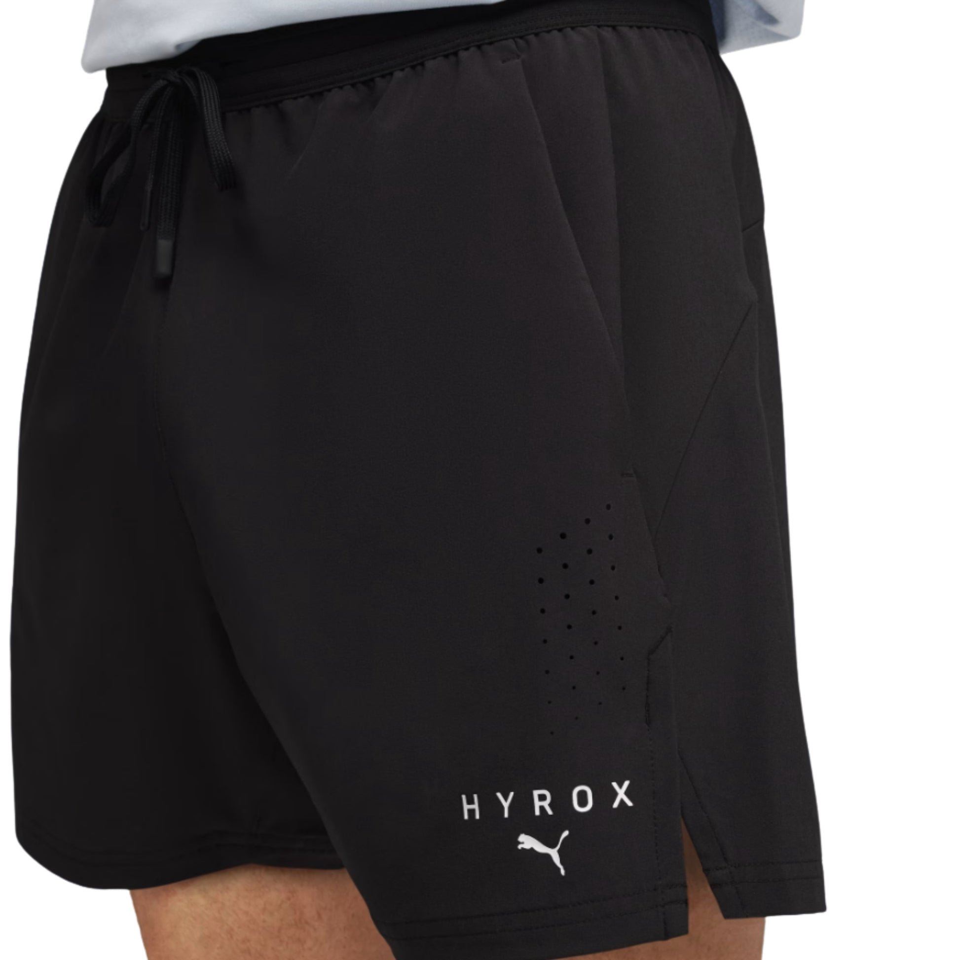 Black Puma shorts with 'HYROX' branding on a white background