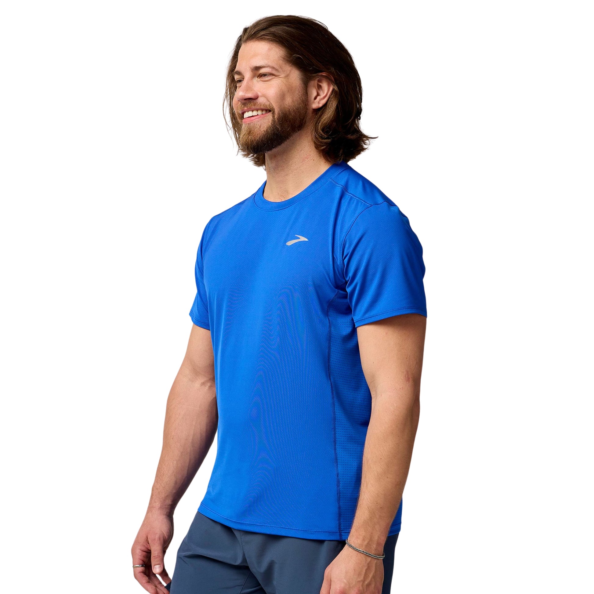 Man wearing a blue athletic shirt on a white background