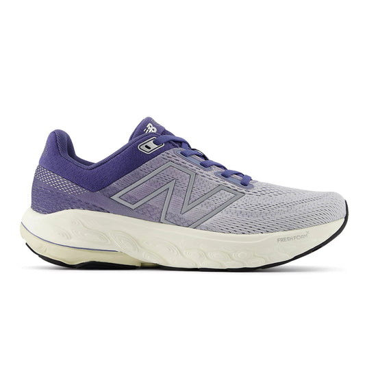 Gray and purple running shoe on a white background