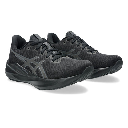 Black Asics running shoes with a prominent brand logo on a white background