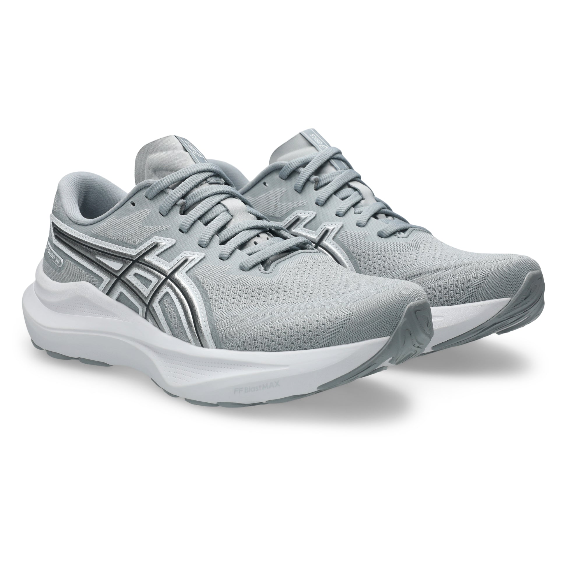 Pair of gray running shoes with white sole on a white background