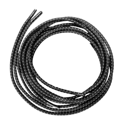 Coiled black shoe lace on a white background