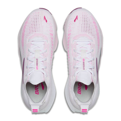 White Brooks running shoes with pink accents on a white background