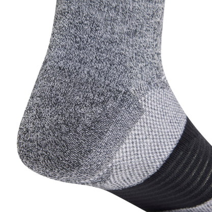 Close-up of a Adidas gray and back sock on a white background