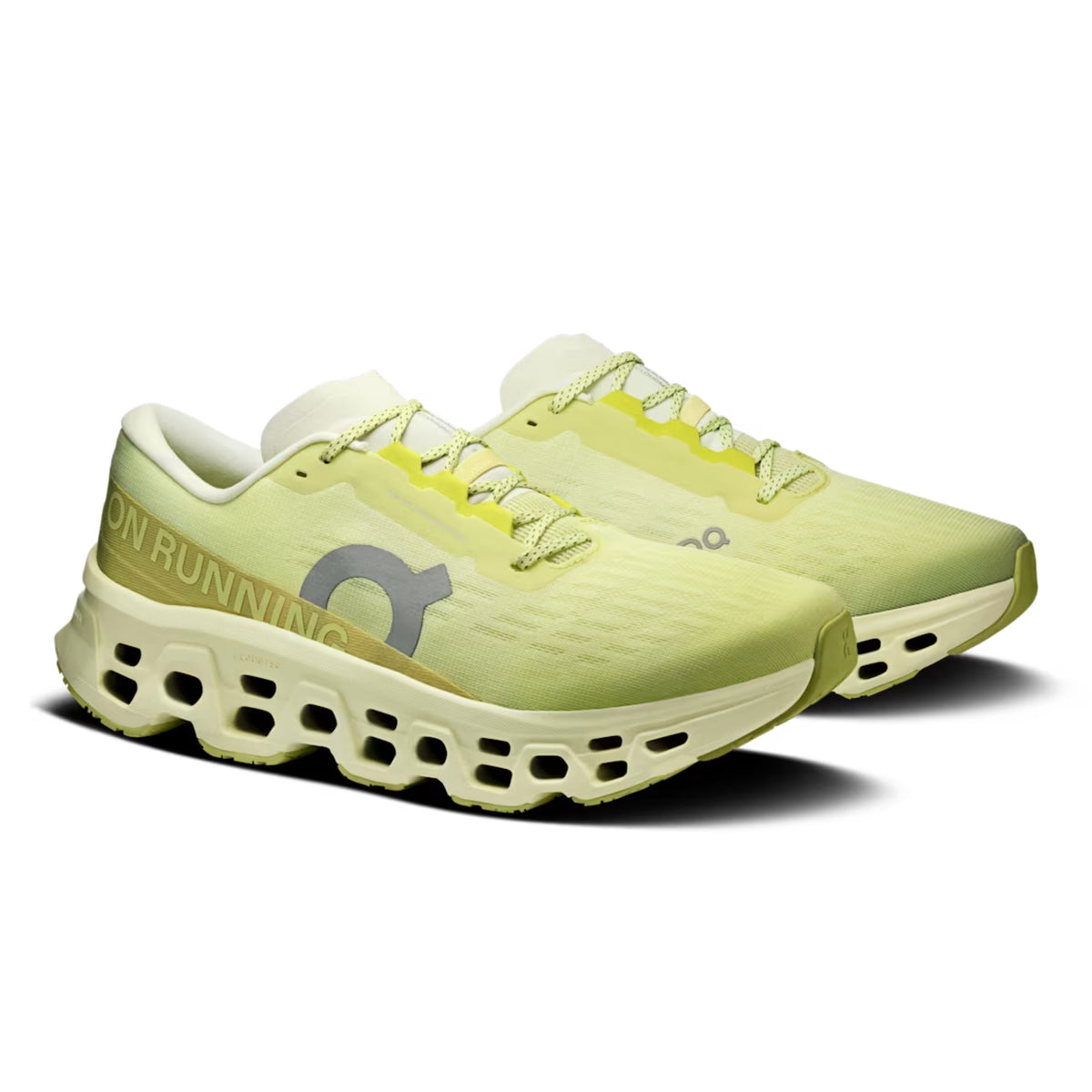 Pair of light green On running shoes on a white background