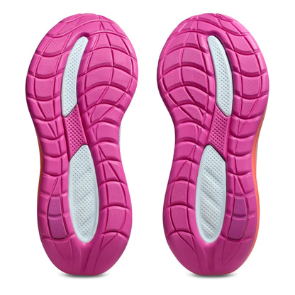 Pink and orange sole of a shoe with white sole liner on a white background