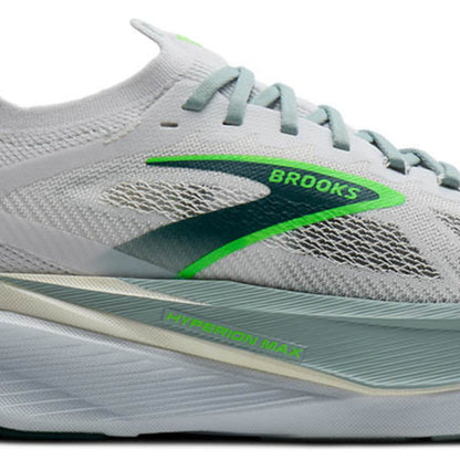 Gray running shoe with green accents and 'Brooks' branding on a white background