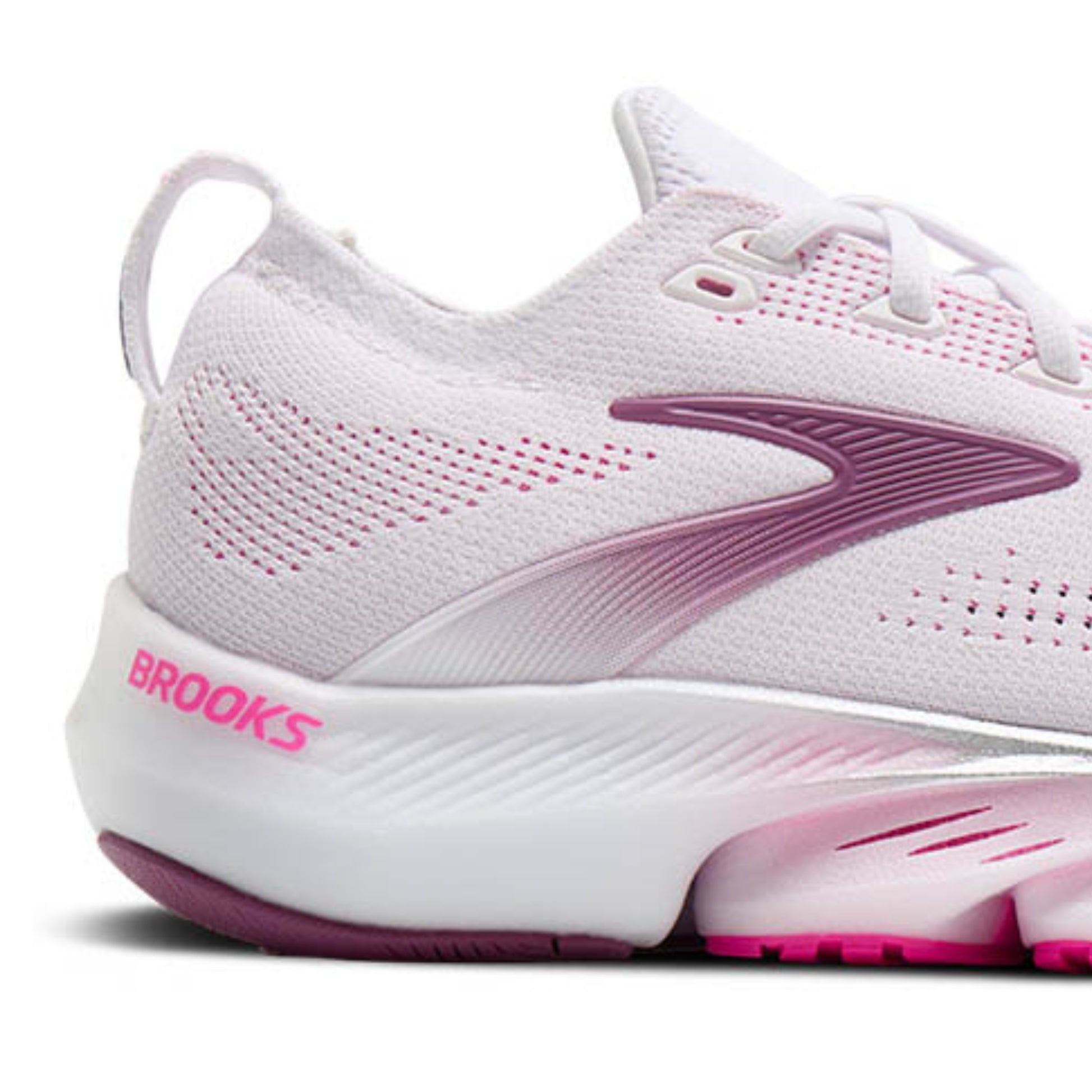 White and pink Brooks running shoe on a white background