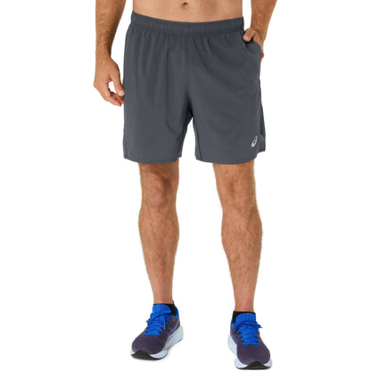 Person wearing gray running shorts on a white background
