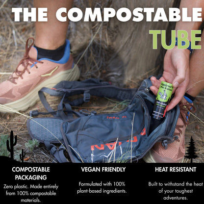 Person holding a compostable tube with outdoor gear and text highlighting features.