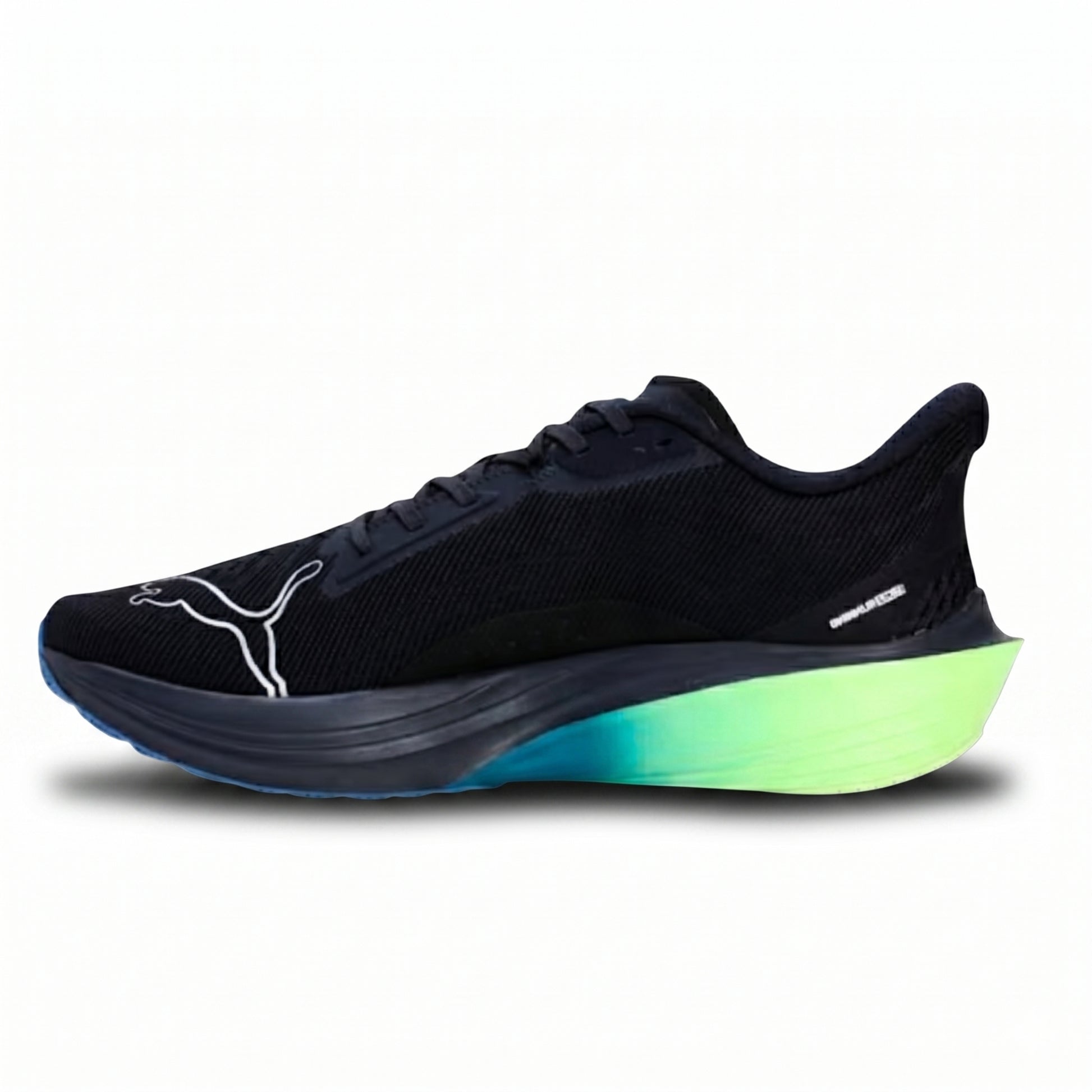 Navy Puma running shoe with green sole on a white background