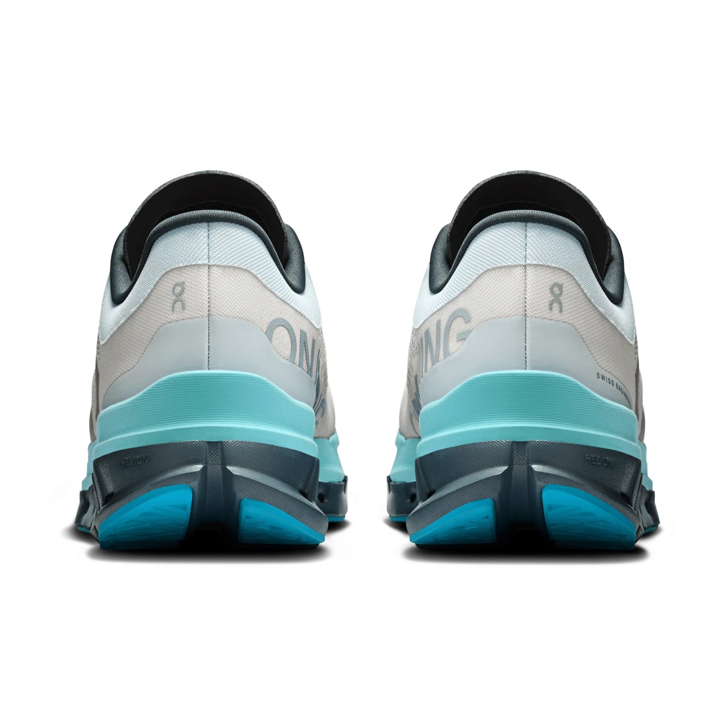 Back view of gray and blue running shoes on a white background